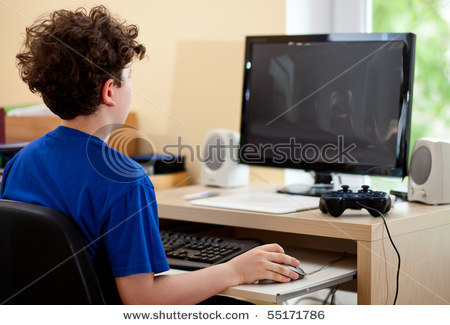 Boy Using Computer Stock Photo