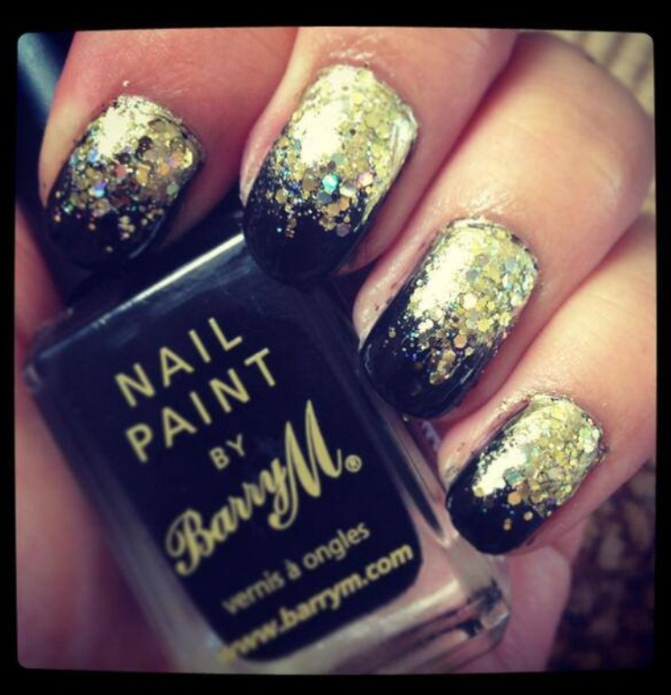 Black and Gold Nail with Designs
