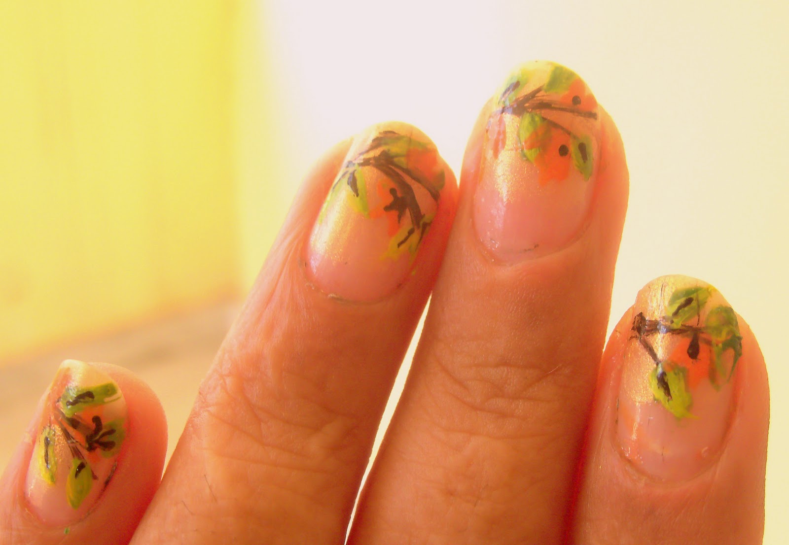 Orange and Green Nail Design