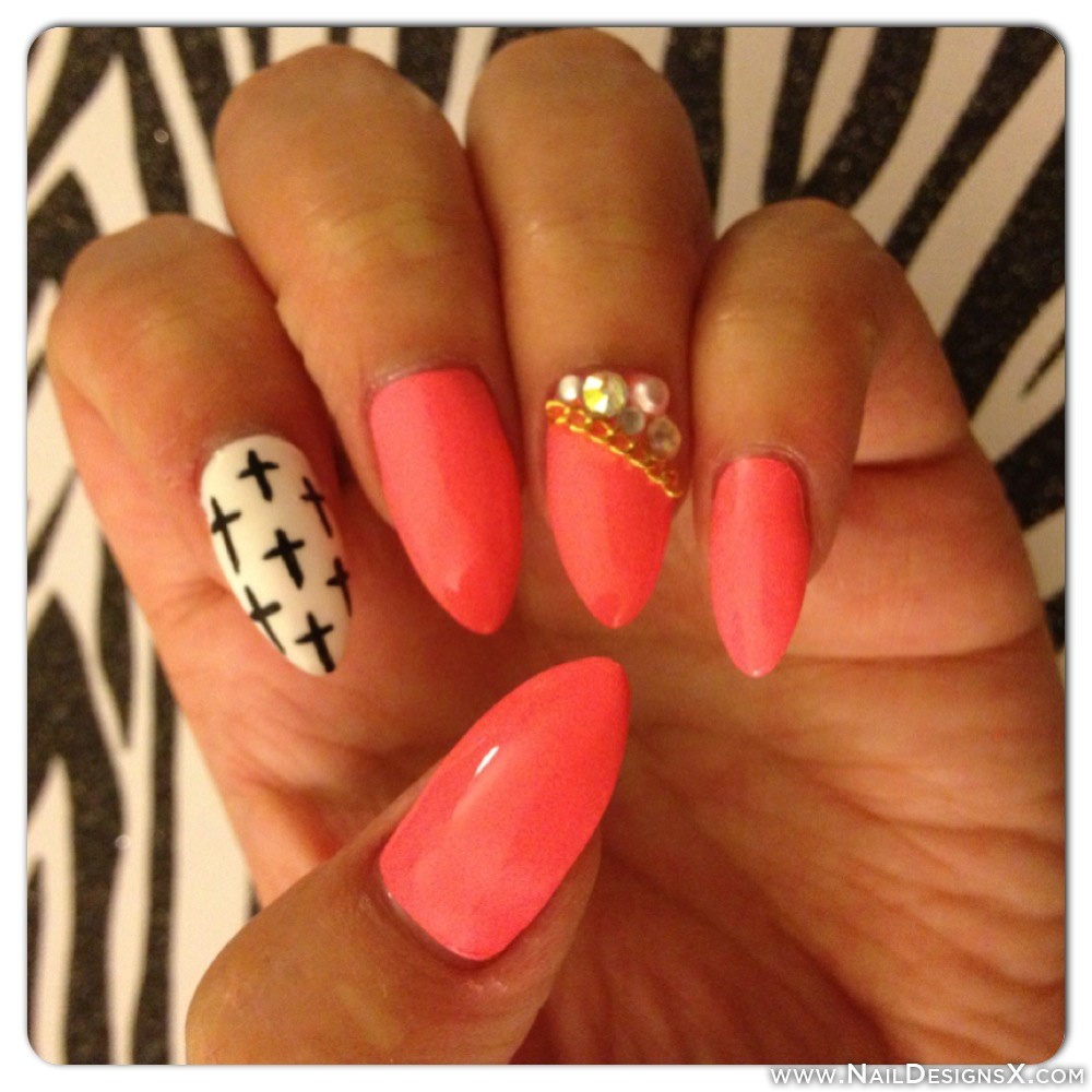 Stiletto Nails with Cross Designs