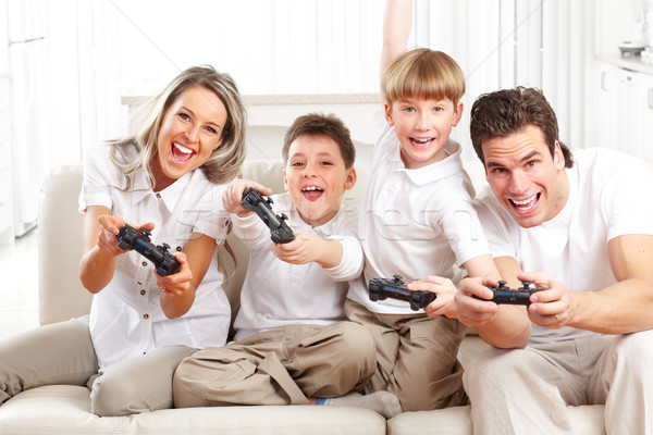 Dad with Kids Playing Video Games