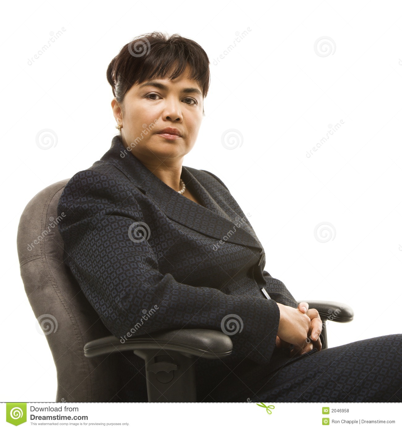 Businesswoman Sitting in Chair Businesswoman Sitting in Chair