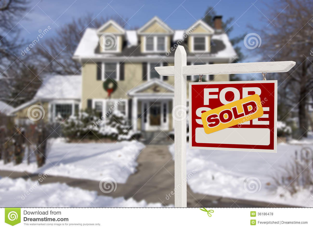 House for Sale Sign Winter