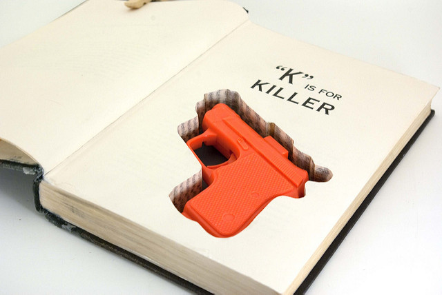Gun in Hollowed Out Book Gun in Hollowed Out Book