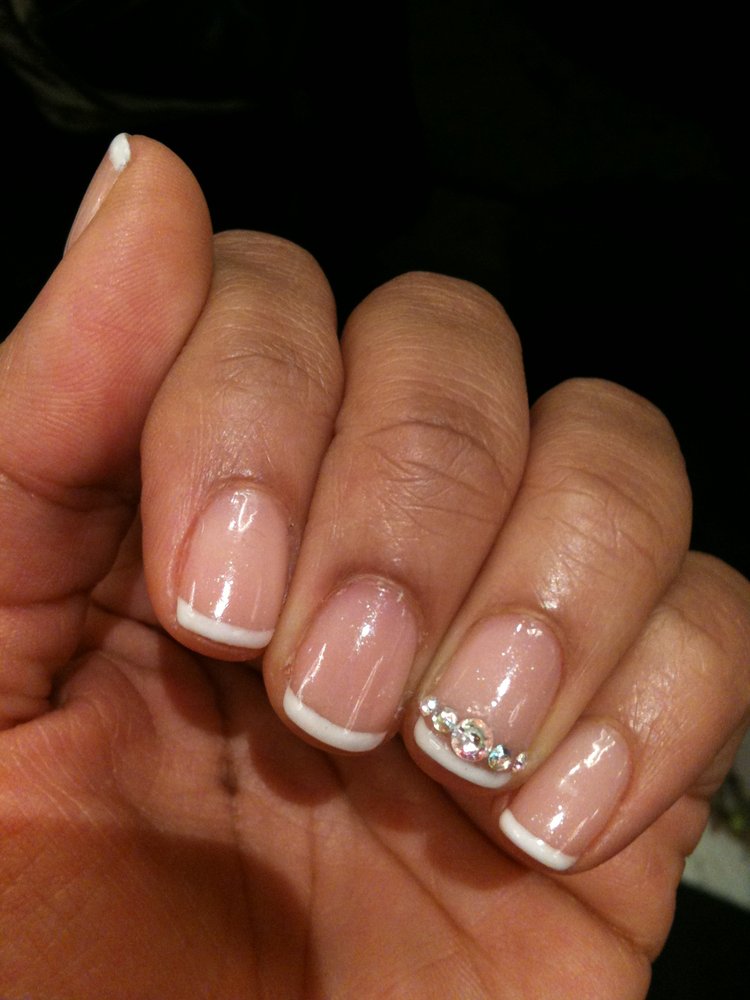 French Manicure with Design On Ring Finger