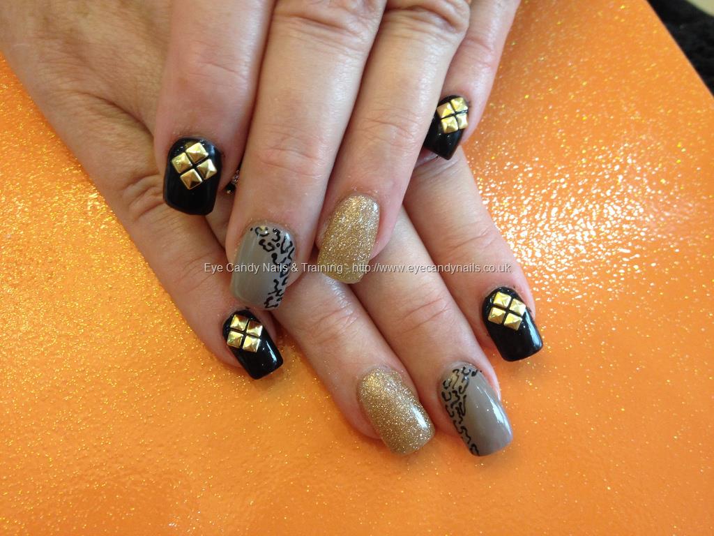 Black and Gold Acrylic Nails