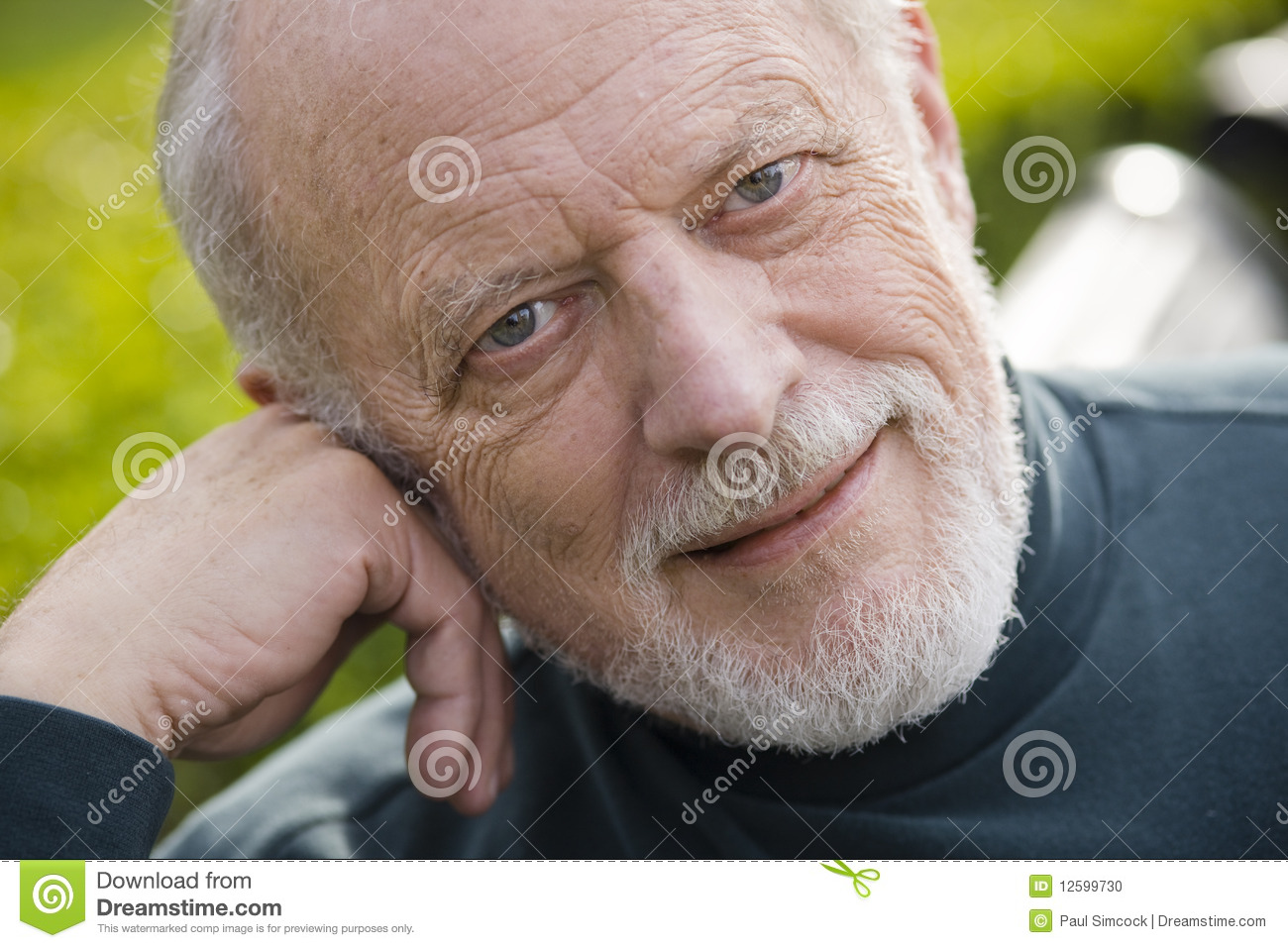 Old Man Sitting On a Park Bench