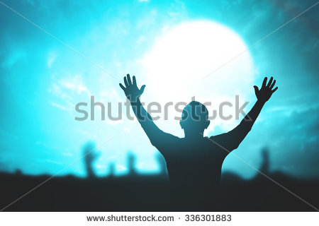 Silhouettes of People Raising Hands to Sky