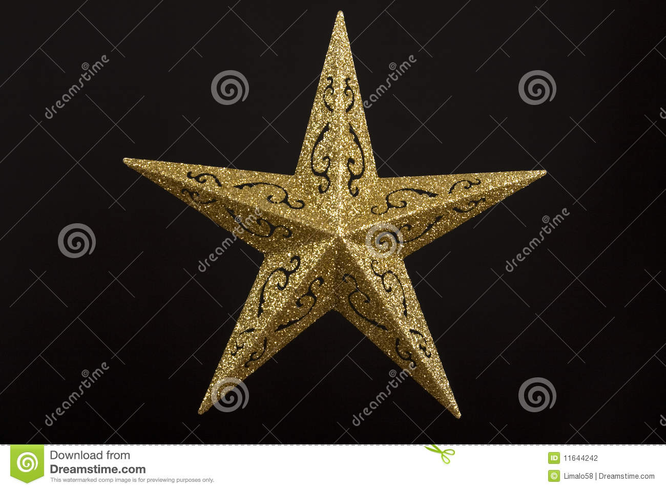 Gold Star Against Black Background