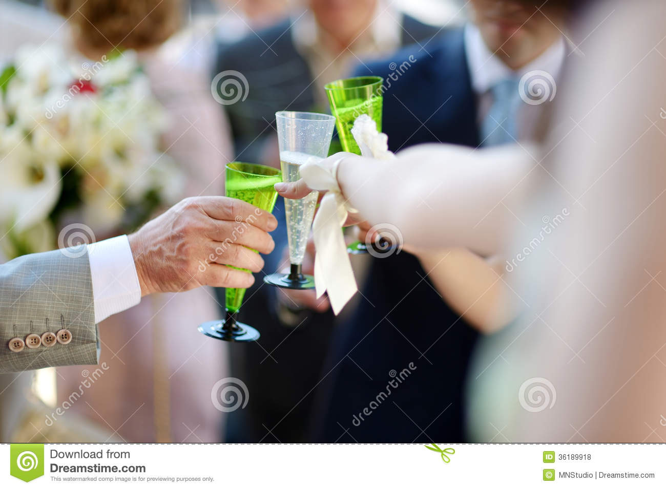 People Holding Wine Glasses