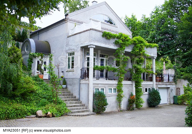 Old Two-Story Home with White Shutters