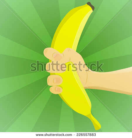 Hand Holding Banana