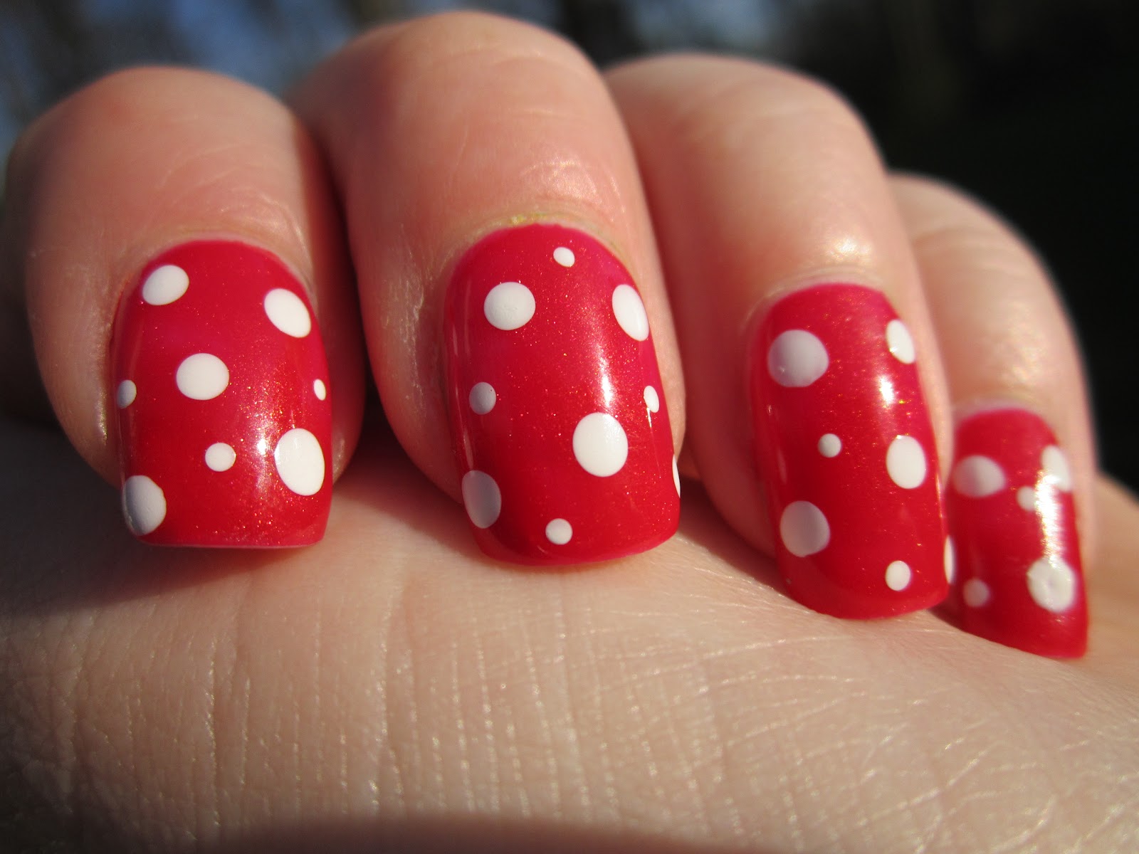 Red Nails with Designs Red Nails with Designs