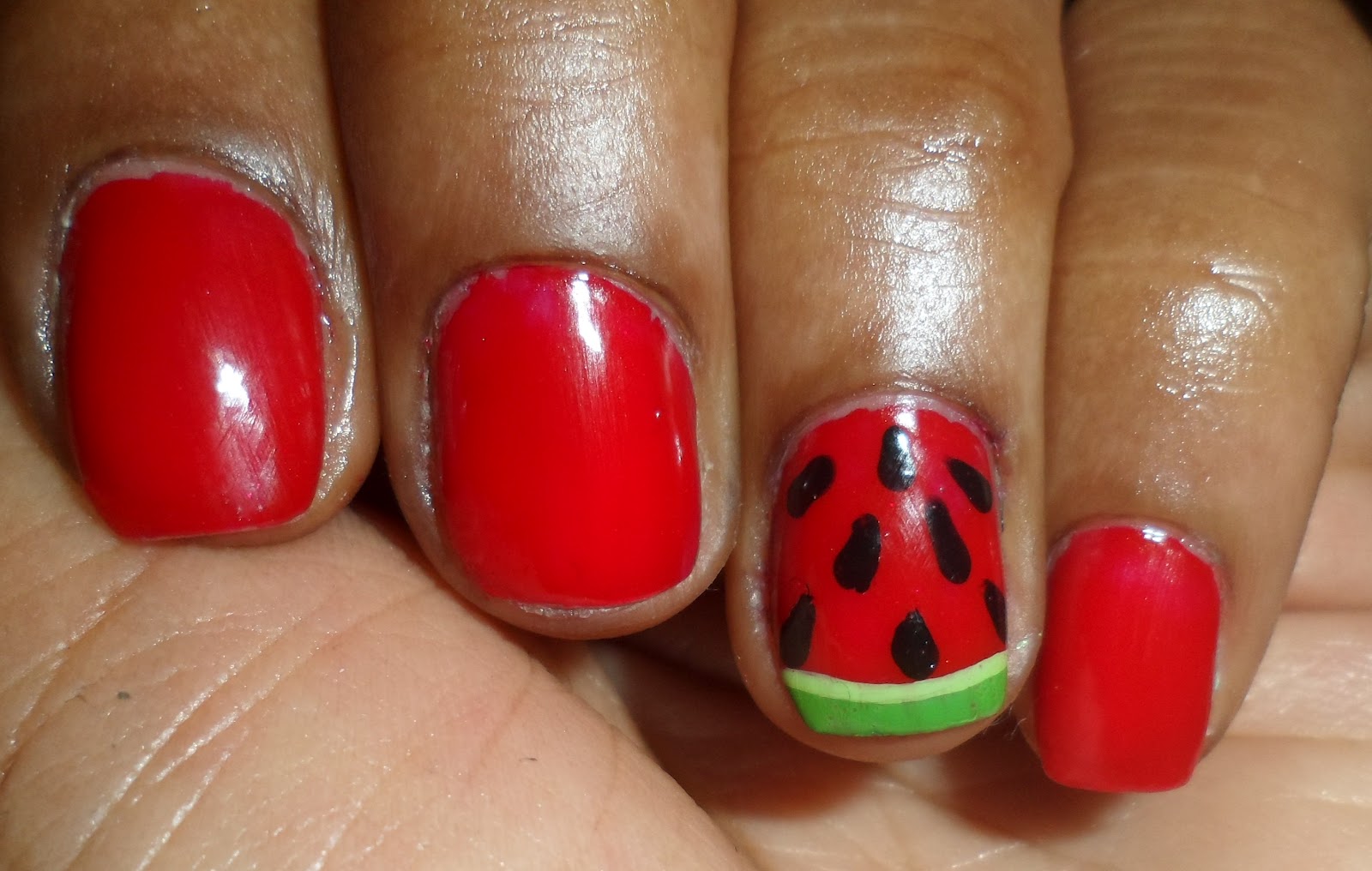 Red Nails with Designs Red Nails with Designs