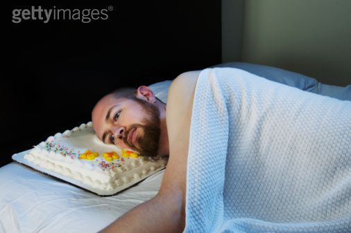 Guy Sleeping On Cake