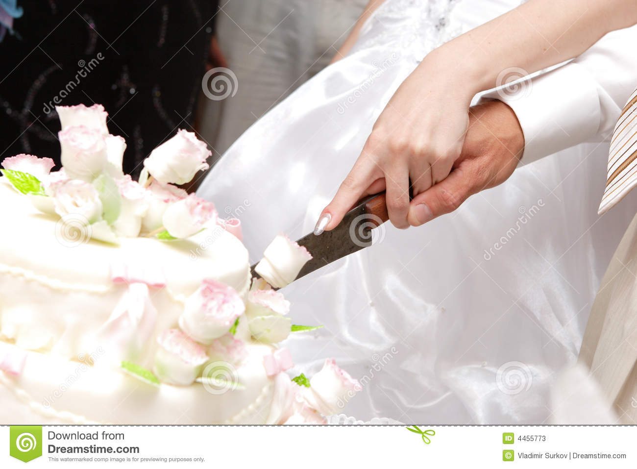 Bride Cutting Wedding Cake