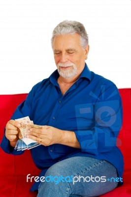 Old Man Holding Money