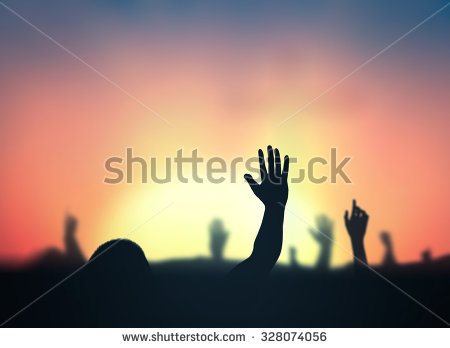 People Raising Hands in Worship