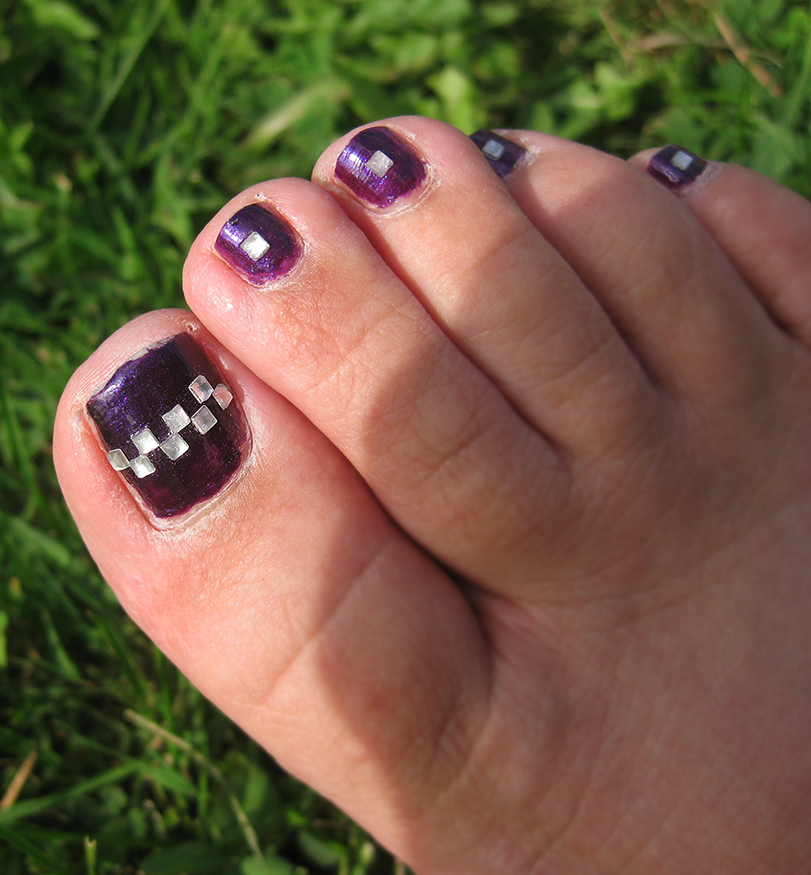 Black and Silver Toe Nail Design