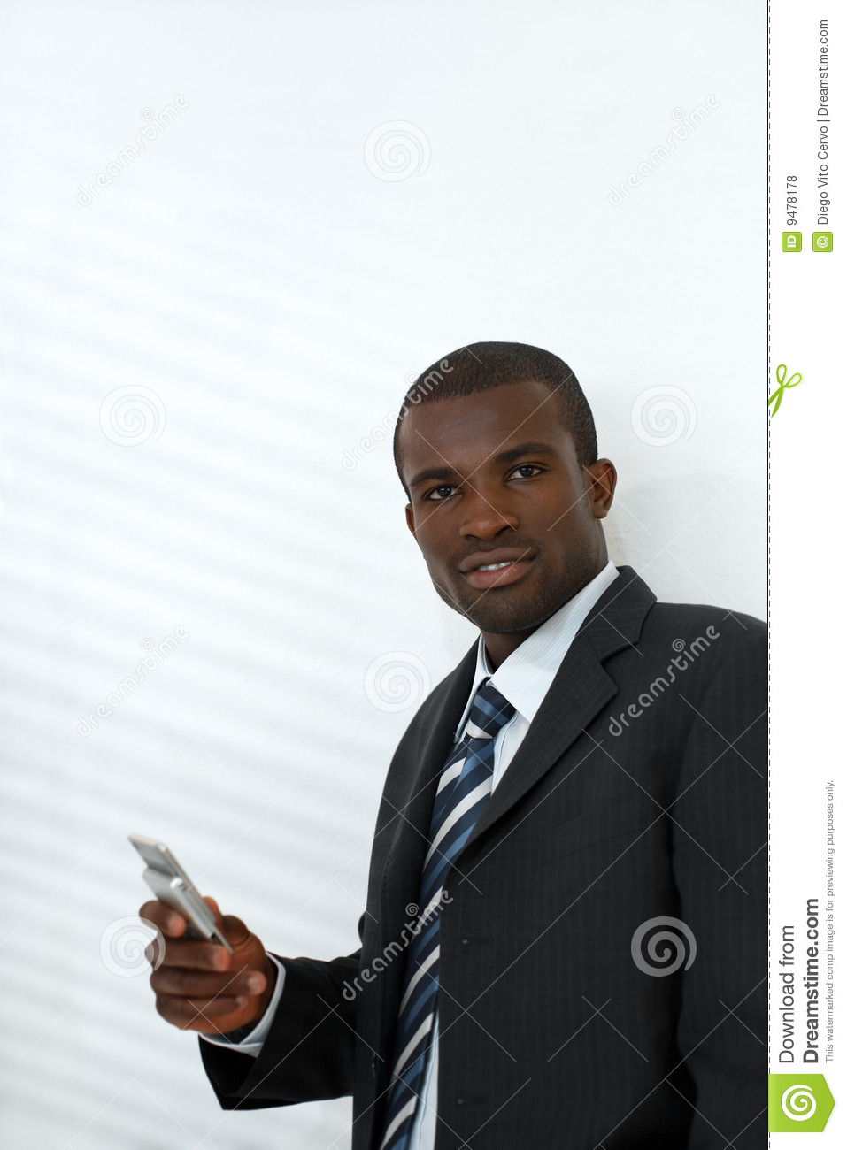 Businessman Holding Mobile Phone