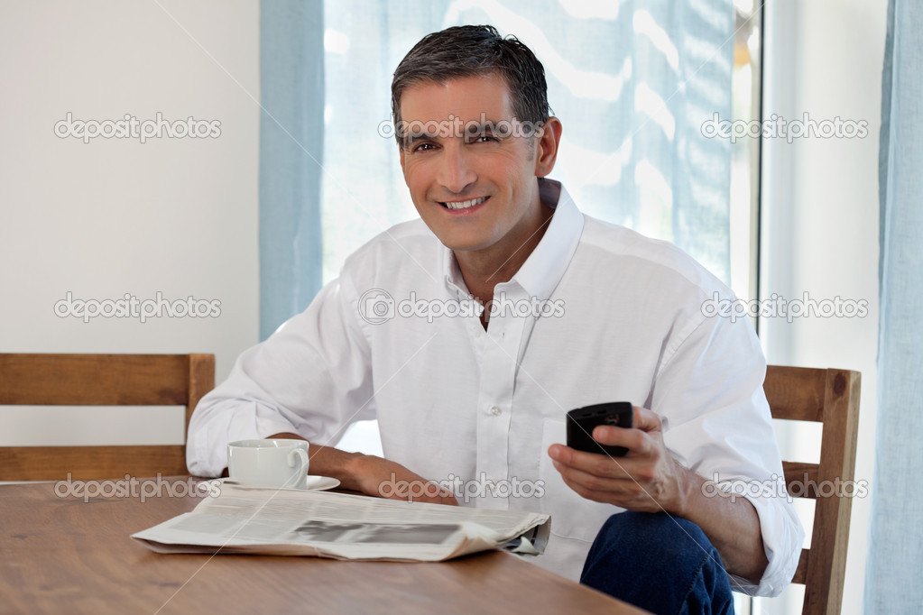 Man Holding Cell Phone