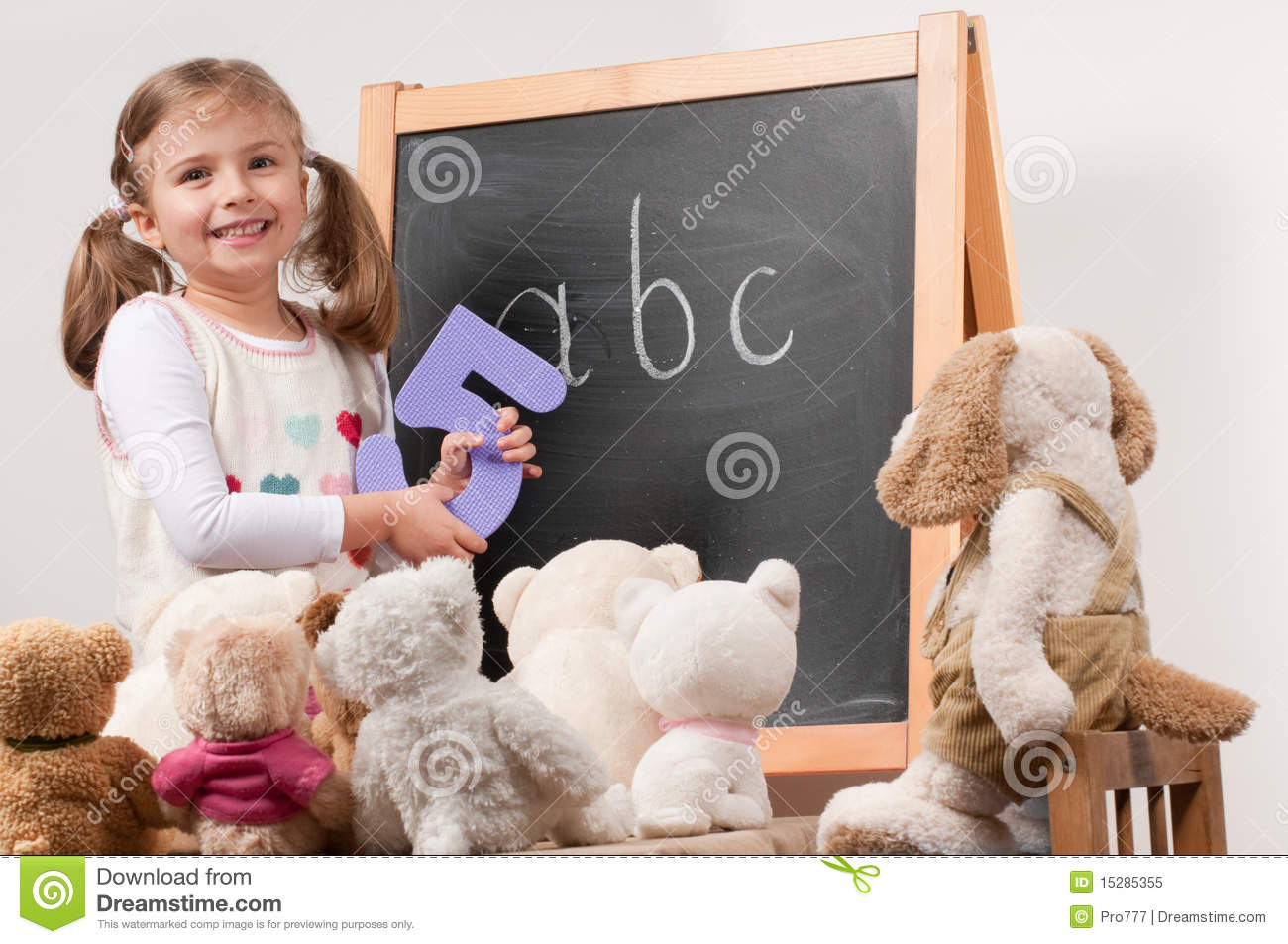 Little Girl Playing Teacher