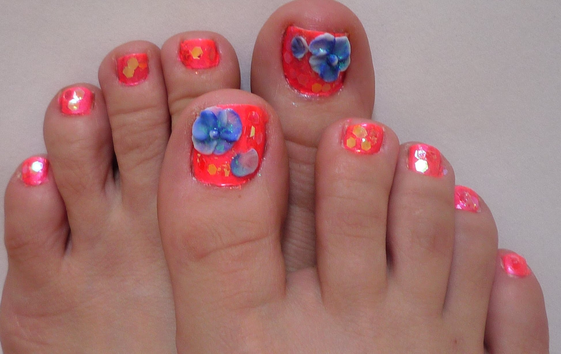 Blue and Orange Toe Nail Designs