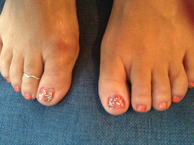 Orange Toe Nails with Design