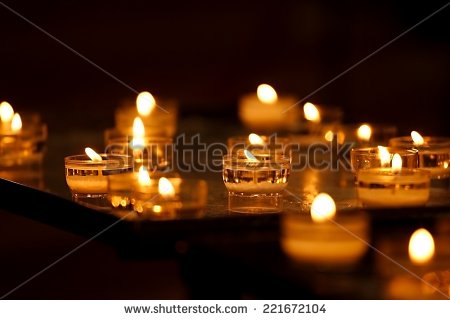 Row of Candles Burning