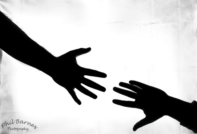 Hand Reaching Out Silhouette