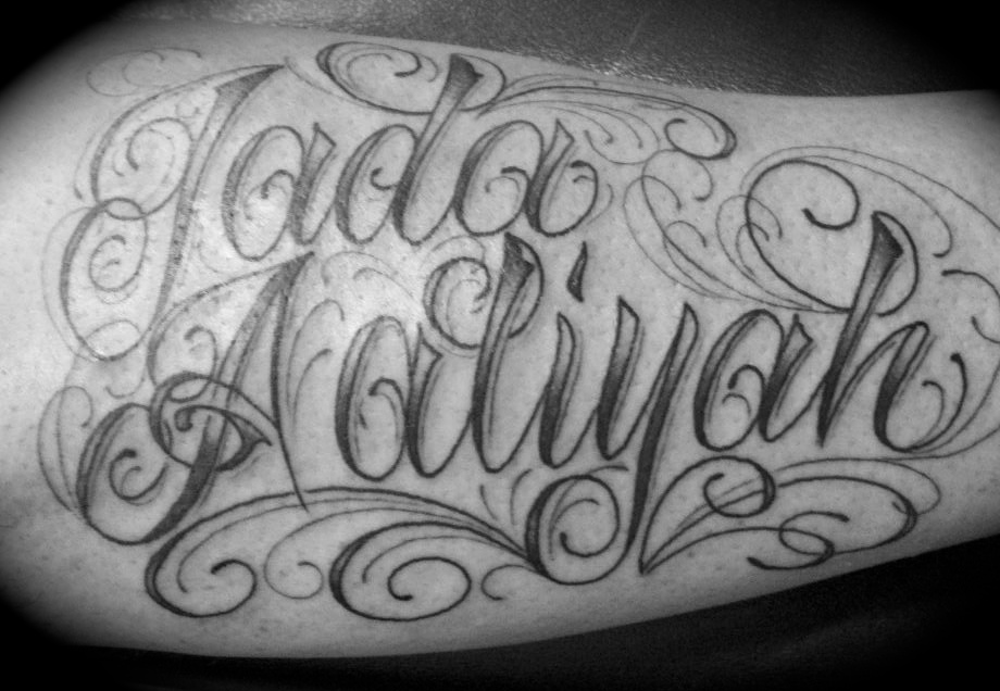 Filigree Lettering Tattoo