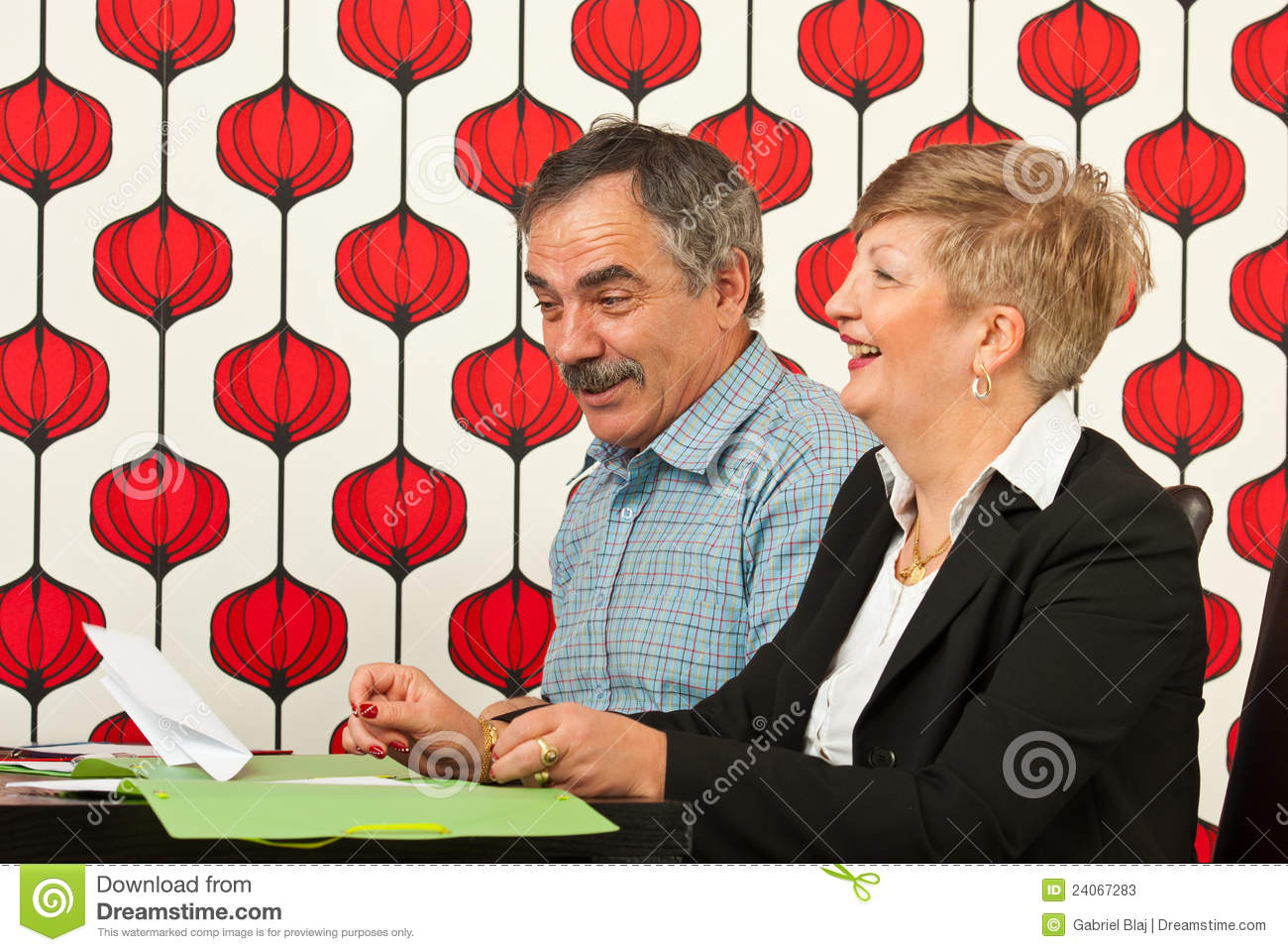 Two Business People Laughing