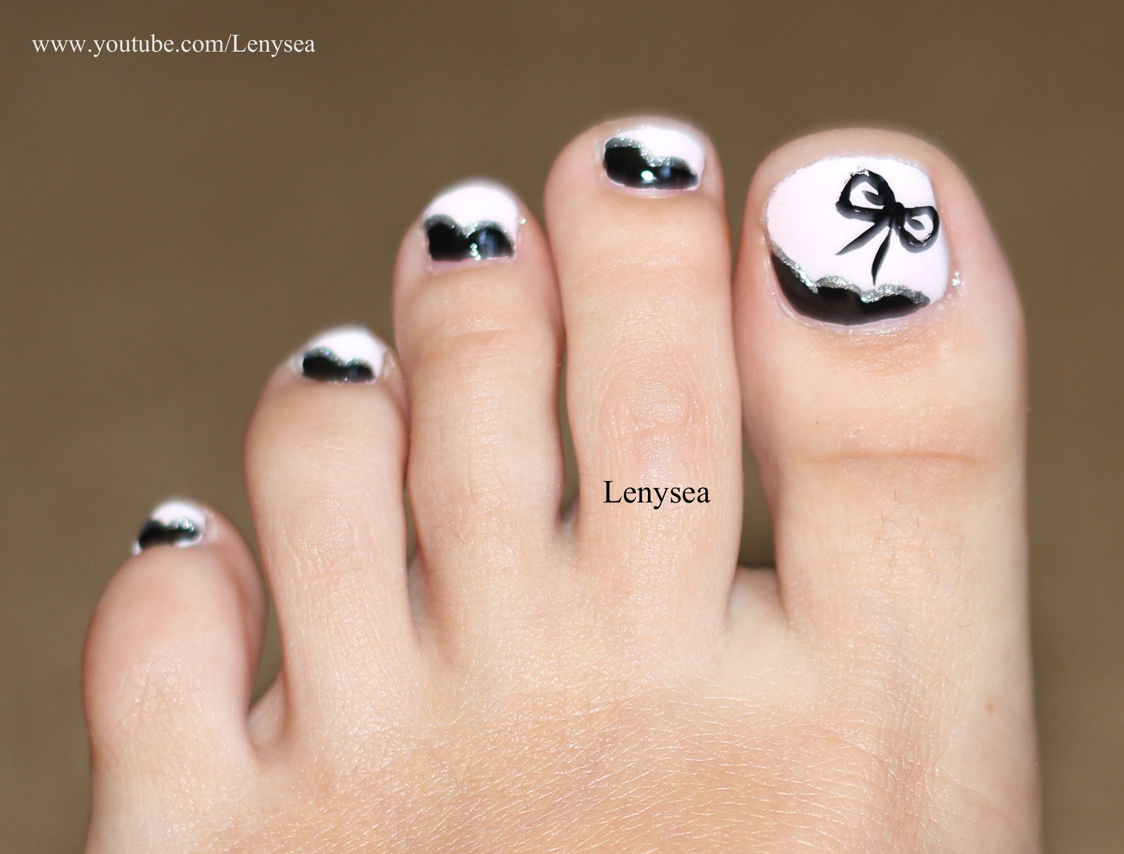 Pink and Black Toe Nail Design