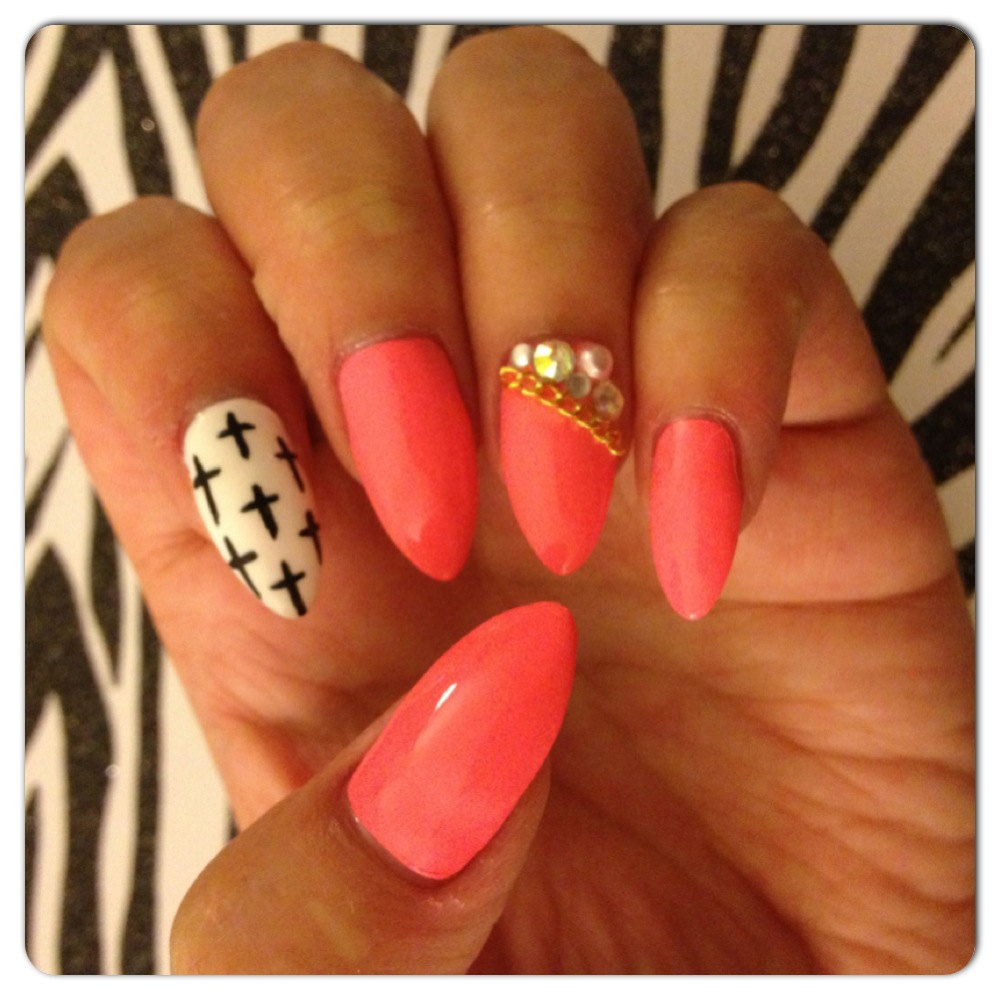 Stiletto Nails with Cross Designs