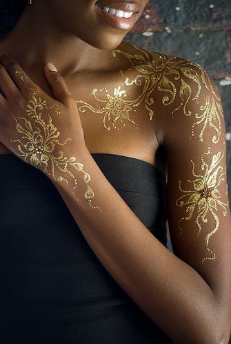 Gold Ink Tattoos On Dark Skin