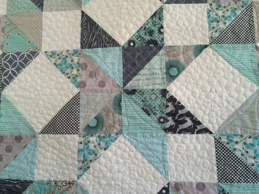 Free Motion Quilting Patterns for Half Square Triangles