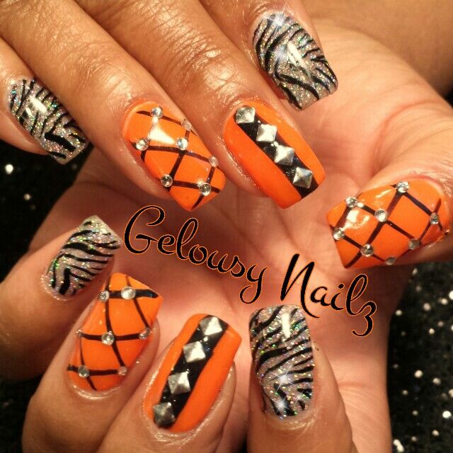 Black and Orange Glitter Nails Designs