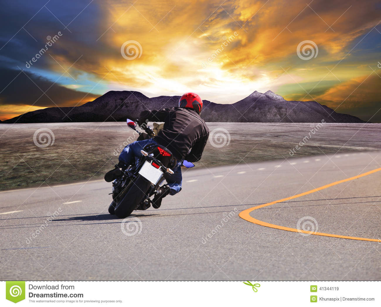 Man Riding Motorcycle On Road Man Riding Motorcycle On Road