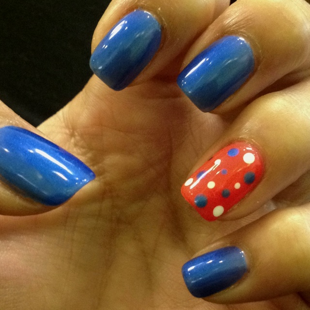 Blue and Orange Polka Dot Nail Design