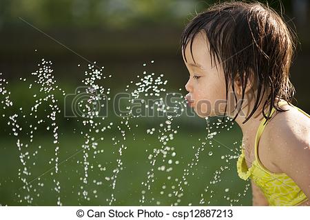 Child Drinking From Water Fountain