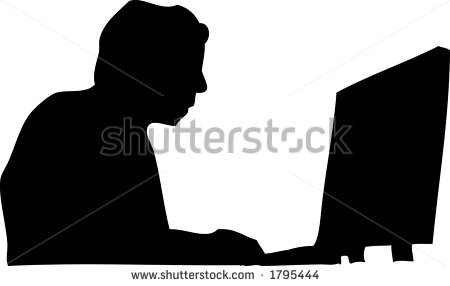 Silhouette of Man Working at Computer