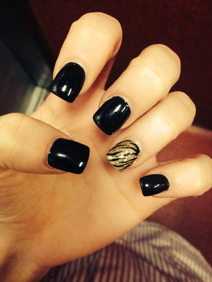 Black and Gold Acrylic Nails Design