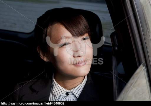 Woman Looking Out Car Window