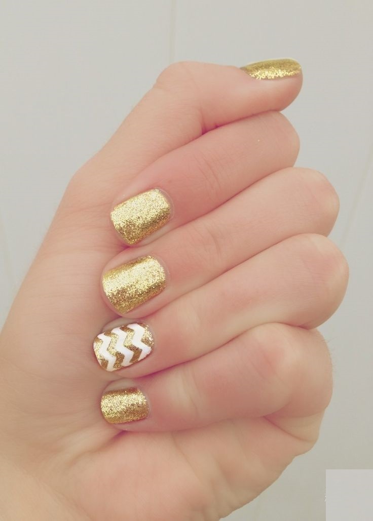 White and Gold Glitter Nail Design
