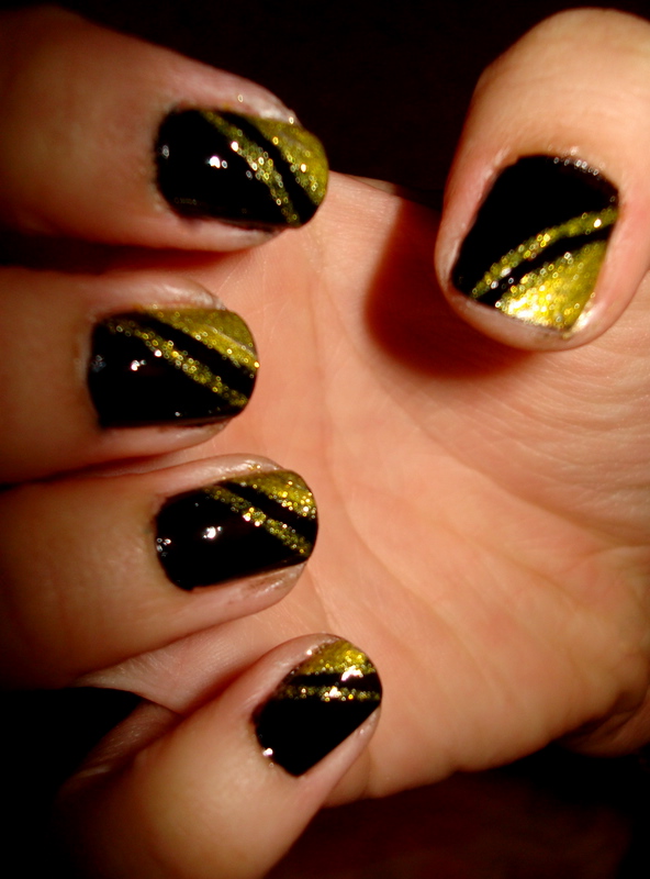 Black and Gold Acrylic Nails Design