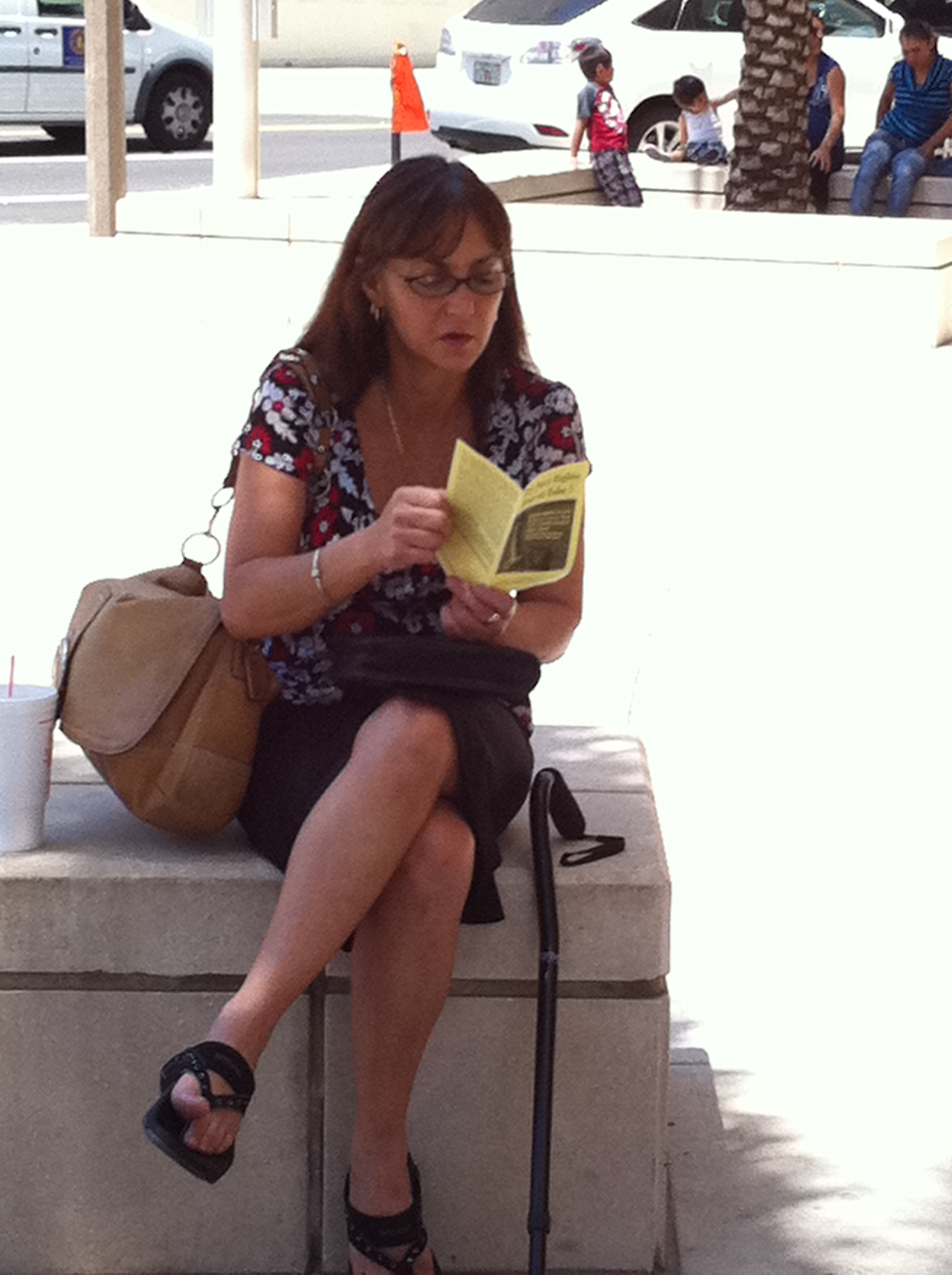 Person Sitting Down Reading