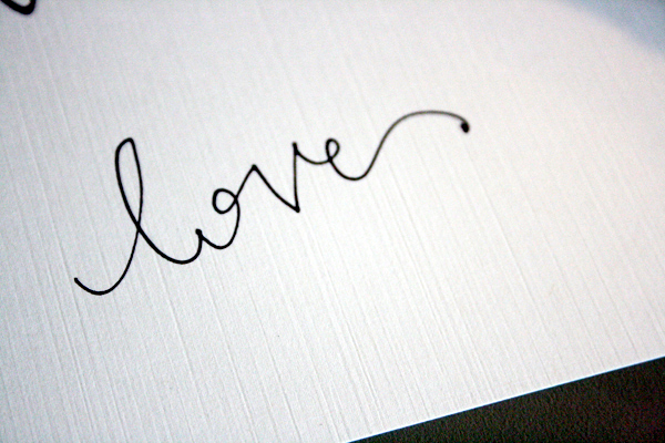 The Word Love in Cursive Writing