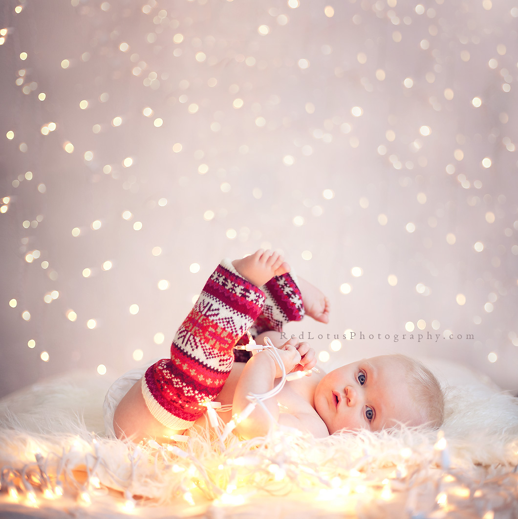 Baby and Christmas Lights